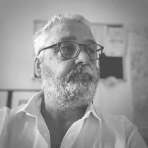 The author in his best white shirt. He is looking meaningfully to the right.