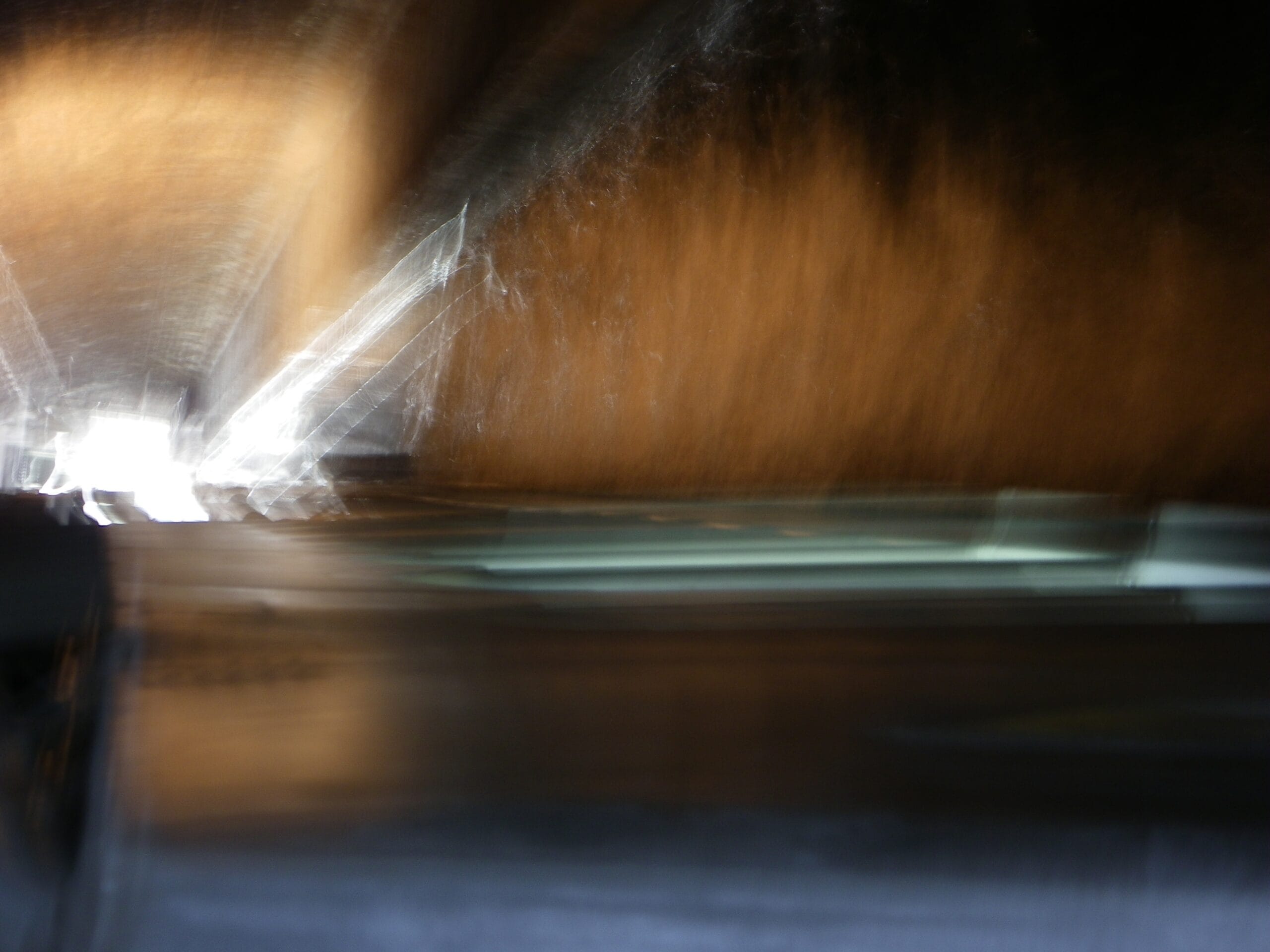 Beneath Paris on the canal. A slow motion shot the speed blurs its contents.