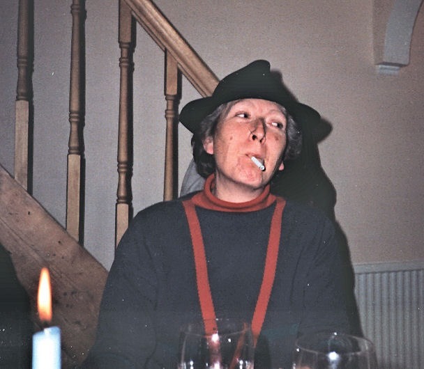 Aunt Patsy Murphy in a hat, drunk and smoking a fag.
