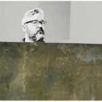 My cartoonised head behind a Richard Serra steel plate in the Prado in Madrid.
